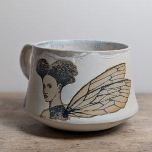 Latte cup with fairy