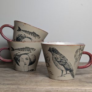 Tass naise, linnu ja kalaga